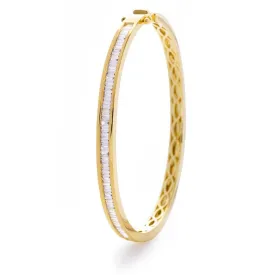 BAGUETTE CUT DIAMOND CHANNEL HALF SET BANGLE IN 18K YELLOW GOLD